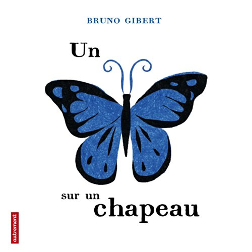 Un papillon sur un chapeau