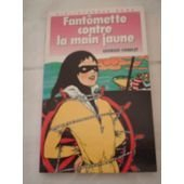 fantomette contre la main jaune